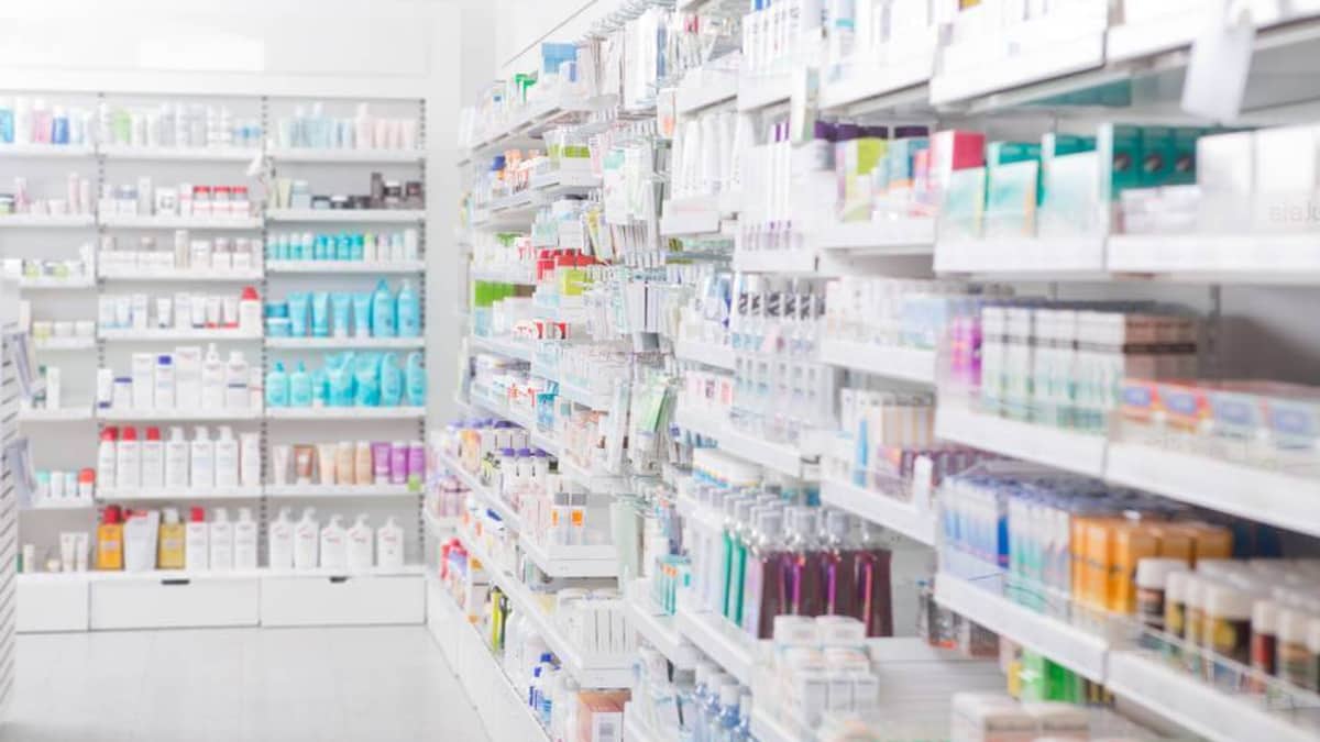 Pharmacy shelves stocked with over-the-counter products